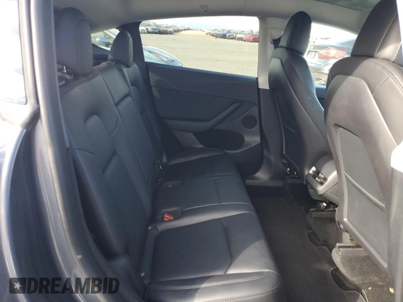 2023 Tesla Model Y Long Range with VIN 7SAYGDEE9PF638742, listed as a Copart auction lot 48188455 with 30,550 mi miles and Salvage Title. Bid and sale history available at DreamBid. Image 10.