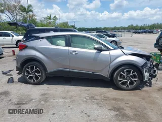 2018 Toyota C-HR XLE with VIN JTNKHMBX7J1009692, listed as a IAAI auction lot 42390685 with 77,866 mi miles and . Bid and sale history available at DreamBid. Image 14.