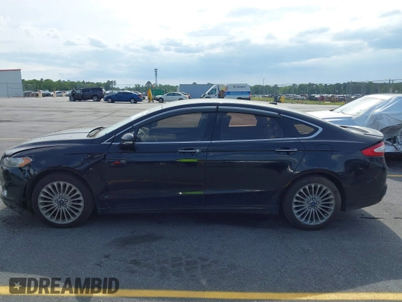 2016 Ford Fusion Titanium with VIN 3FA6P0K90GR179528, listed as a IAAI auction lot 42181213 with 230,264 mi miles. Bid and sale history available at carsss.com. Image 14.