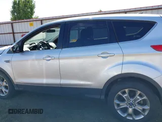 2013 Ford Escape SEL with VIN 1FMCU0H96DUA30733, listed as a IAAI auction lot 42737439 with 106,651 mi miles and . Bid and sale history available at DreamBid. Image 14.