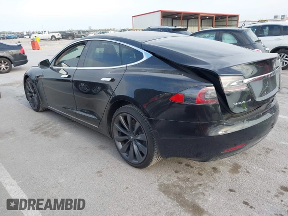 2017 Tesla Model S 100D with VIN 5YJSA1E28HF188981, listed as a IAAI auction lot 42010115 with 76,327 mi miles and . Bid and sale history available at DreamBid. Image 3.