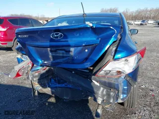 2015 Hyundai Accent GLS with VIN KMHCT4AE6FU916149, listed as a IAAI auction lot 41082268 with 153,219 mi miles. Bid and sale history available at carsss.com. Image 6.