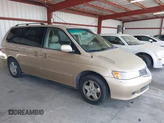 2001 Honda Odyssey EX z VIN 2HKRL18621H522999, wystawiony jako IAAI lot #42430506 z przebiegiem 150 347 mil mil oraz . Historia ofert i sprzedaży dostępna na DreamBid. Obrazek 1.