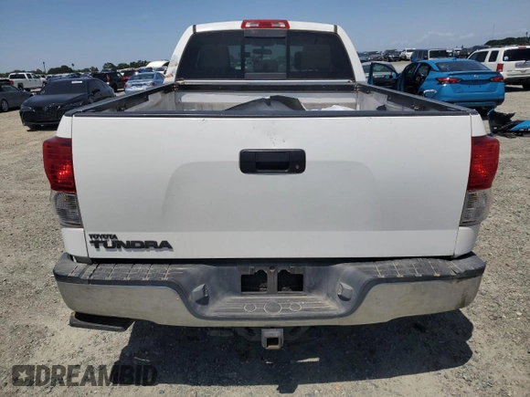 2012 Toyota Tundra with VIN 5TFRM5F14CX039145, listed as a Copart auction lot 56520015 with 129,114 mi miles and Salvage title. Bid and sale history available at DreamBid. Image 6.