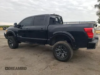 2022 Nissan Titan SV with VIN 1N6AA1ED2NN103267, listed as a Copart auction lot 68942064 with 55,119 mi miles and Salvage title. Bid and sale history available at DreamBid. Image 2.