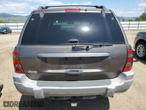 2000 Jeep Grand Cherokee Laredo with VIN 1J4G248S6YC333068, listed as a Copart auction lot 54972765 with 183,775 mi miles and Clean title. Bid and sale history available at DreamBid. Image 6.