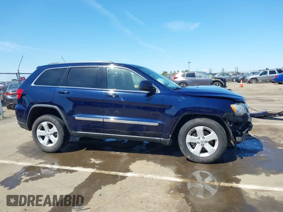 2012 Jeep Grand Cherokee Laredo with VIN 1C4RJFAG0CC160255, listed as a IAAI auction lot 41967809 with 127,702 mi miles. Bid and sale history available at carsss.com. Image 14.