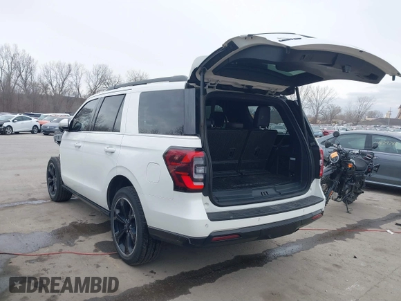 2023 Ford Expedition Limited with VIN 1FMJU2A8XPEA34223, listed as a IAAI auction lot 41815116 with 25,427 mi miles and . Bid and sale history available at DreamBid. Image 3.