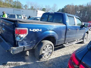 2012 Ford F-150 XL with VIN 1FTFW1ET0CFB31819, listed as a IAAI auction lot 41380934 with 173,544 mi miles. Bid and sale history available at carsss.com. Image 13.