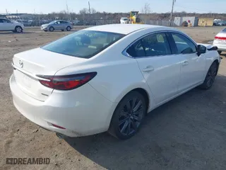 2021 Mazda Mazda6 Touring with VIN JM1GL1VM8M1615516, listed as a IAAI auction lot 41531402 with 59,585 mi miles. Bid and sale history available at carsss.com. Image 4.