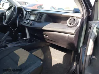 2018 Toyota RAV4 LE with VIN 2T3ZFREVXJW457751, listed as a IAAI auction lot 41529251 with 230,054 mi miles. Bid and sale history available at carsss.com. Image 5.