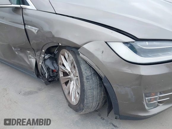 2016 Tesla Model X 70D with VIN 5YJXCBE22GF017499, listed as a IAAI auction lot 42192962 with 103,430 mi miles and . Bid and sale history available at DreamBid. Image 6.