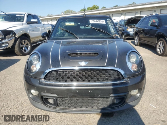 2014 MINI Convertible S с VIN WMWZP3C52ET706661, выставлен на аукционе Copart как лот 70040934 с пробегом 65 484 миль миль и Списание • Salvage title. История ставок и продаж доступна на DreamBid. Изображение 5.