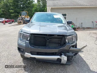 2024 Ford Ranger XLT z VIN 1FTER4HH3RLE16911, wystawiony jako IAAI lot #42596544 z przebiegiem 16 657 mil mil oraz . Historia ofert i sprzedaży dostępna na DreamBid. Obrazek 13.