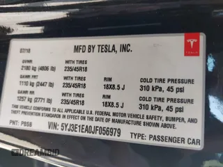 2018 Tesla Model 3 Long Range Battery with VIN 5YJ3E1EA0JF056979, listed as a IAAI auction lot 41865849 with 97,319 mi miles. Bid and sale history available at carsss.com. Image 9.