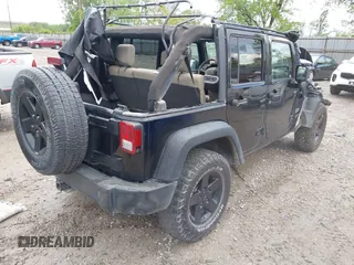 2008 Jeep Wrangler Unlimited X with VIN 1J4GA39108L501130, listed as a IAAI auction lot 42182601 with 177,507 mi miles and . Bid and sale history available at DreamBid. Image 4.