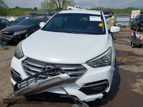 2017 Hyundai Santa Fe 2.4L z VIN 5XYZTDLB3HG439072, wystawiony jako IAAI lot #42061127 z przebiegiem 145 864 mil mil oraz . Historia ofert i sprzedaży dostępna na DreamBid. Obrazek 6.
