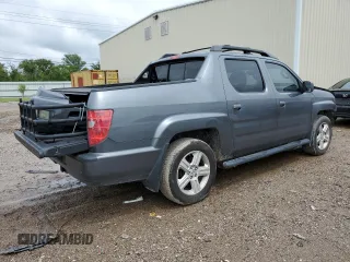 2011 Honda Ridgeline RTL with VIN 5FPYK1F52BB009042, listed as a Copart auction lot 69439004 with 119,889 mi miles and Salvage Title. Bid and sale history available at carsss.com. Image 3.