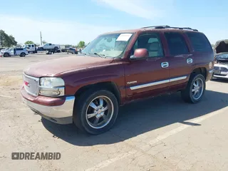 2001 GMC Yukon SLT with VIN 1GKEK13V81J100005, listed as a IAAI auction lot 42090494 with 276,042 mi miles. Bid and sale history available at carsss.com. Image 2.