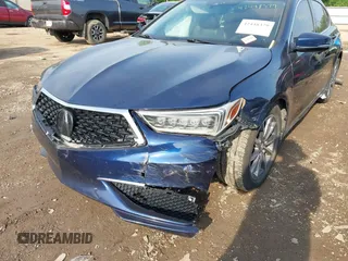 2019 Acura TLX z VIN 19UUB1F37KA010834, wystawiony jako IAAI lot #42448379 z przebiegiem 83 098 mil mil oraz . Historia ofert i sprzedaży dostępna na DreamBid. Obrazek 6.