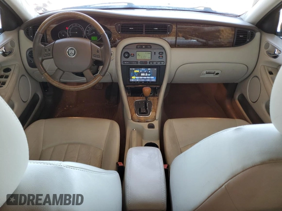 2004 Jaguar X-Type with VIN SAJEA51C14WE06627, listed as a Copart auction lot 54925735 with 107,756 mi miles and Clean Title. Bid and sale history available at DreamBid. Image 8.