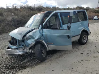 1989 GMC Safari z VIN 1GKDM15Z4KB517560, wystawiony jako Copart lot #51775615 z przebiegiem 152 882 mil mil oraz Szkody całkowita. Historia ofert i sprzedaży dostępna na DreamBid. Obrazek 1.
