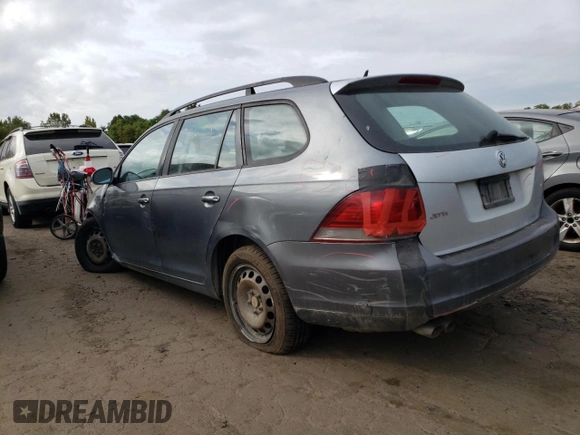 2014 Volkswagen Jetta S with VIN 3VWKP7AJ7EM625775, listed as a Copart auction lot 72541654 with 153,584 mi miles and Salvage title. Bid and sale history available at DreamBid. Image 2.