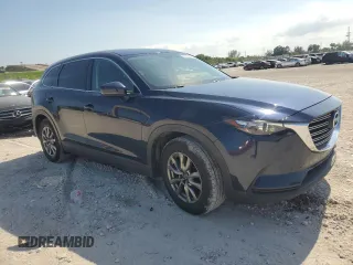 2016 Mazda CX-9 Touring z VIN JM3TCACY8G0117354, wystawiony jako Copart lot #56660935 z przebiegiem 112 365 mil mil oraz Szkoda całkowita • Salvage title. Historia ofert i sprzedaży dostępna na DreamBid. Obrazek 4.