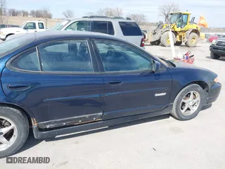 2003 Pontiac Grand Prix GT with VIN 1G2WP52K53F148801, listed as a IAAI auction lot 41888412 with 135,142 mi miles. Bid and sale history available at carsss.com. Image 14.
