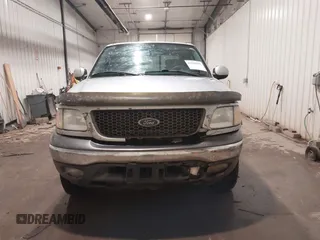 2003 Ford F-150 XLT with VIN 1FTRW08L83KA45989, listed as a IAAI auction lot 41048095 with 226,328 mi miles. Bid and sale history available at carsss.com. Image 13.