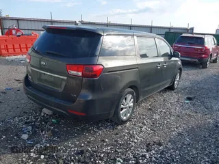 2017 Kia Sedona LX with VIN KNDMB5C11H6230541, listed as a IAAI auction lot 42034761 with 171,495 mi miles. Bid and sale history available at carsss.com. Image 4.