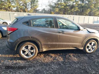 2021 Honda HR-V LX with VIN 3CZRU5H3XMM734410, listed as a IAAI auction lot 41441387 with 63,055 mi miles. Bid and sale history available at carsss.com. Image 13.