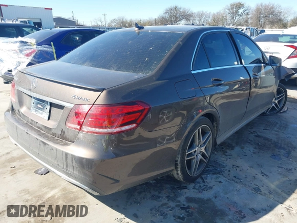 2014 Mercedes-Benz E 550 Sport with VIN WDDHF9BB5EA971894, listed as a IAAI auction lot 41405571 with 113,363 mi miles and . Bid and sale history available at DreamBid. Image 4.