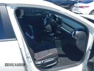 2024 Kia Forte GT with VIN 3KPF44AC3RE821239, listed as a IAAI auction lot 42025884 with 6,593 mi miles and . Bid and sale history available at DreamBid. Image 5.