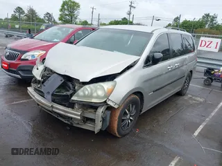 2005 Honda Odyssey EX with VIN 5FNRL38445B412759, listed as a IAAI auction lot 41975304 with 133,221 mi miles. Bid and sale history available at carsss.com. Image 2.