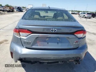 2023 Toyota Corolla Hybrid LE with VIN JTDBCMFE6P3015167, listed as a Copart auction lot 52114915 with 35,334 mi miles and Salvage Title. Bid and sale history available at carsss.com. Image 6.