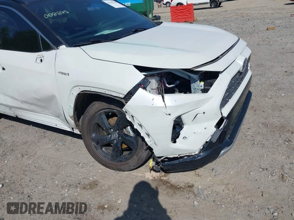 2021 Toyota RAV4 Hybrid XSE with VIN JTME6RFV4MJ008825, listed as a IAAI auction lot 42060148 with 91,129 mi miles and . Bid and sale history available at DreamBid. Image 6.