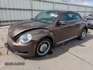 2013 Volkswagen Beetle with VIN 3VWHX7AT8DM603424, listed as a Copart auction lot 51019185 with 136,196 mi miles and Salvage Title. Bid and sale history available at DreamBid. Image 1.
