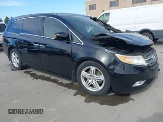 2013 Honda Odyssey Touring with VIN 5FNRL5H98DB003220, listed as a IAAI auction lot 41664729 with Not Provided miles and . Bid and sale history available at carsss.com. Image 1.