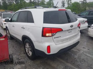 2014 Kia Sorento LX with VIN 5XYKT4A70EG489682, listed as a IAAI auction lot 42088723 with 180,471 mi miles and . Bid and sale history available at carsss.com. Image 3.