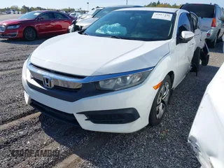 2016 Honda Civic Sedan LX with VIN 2HGFC2F53GH556228, listed as a IAAI auction lot 41867448 with 157,970 mi miles. Bid and sale history available at carsss.com. Image 2.