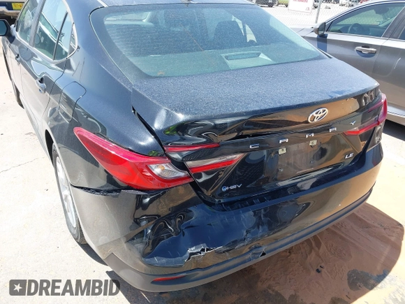 2025 Toyota Camry LE with VIN 4T1DAACK9SU522182, listed as a IAAI auction lot 42048972 with 18,498 mi miles and . Bid and sale history available at DreamBid. Image 6.