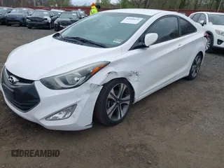 2014 Hyundai Elantra z VIN KMHDH6AH7EU025555, wystawiony jako IAAI lot #42080211 z przebiegiem 95 333 mil mil oraz . Historia ofert i sprzedaży dostępna na DreamBid. Obrazek 6.
