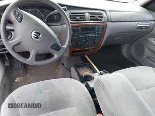 2003 Mercury Sable GS z VIN 1MEFM50U93G635100, wystawiony jako IAAI lot #42424689 z przebiegiem 231 397 mil mil oraz . Historia ofert i sprzedaży dostępna na DreamBid. Obrazek 16.