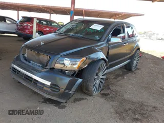 2010 Dodge Caliber SXT z VIN 1B3CB4HA3AD612829, wystawiony jako IAAI lot #42303635 z przebiegiem 230 191 mil mil oraz . Historia ofert i sprzedaży dostępna na DreamBid. Obrazek 16.