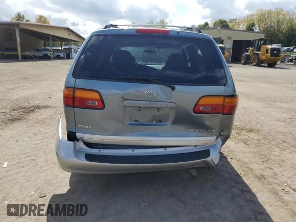 2000 Toyota Sienna LE with VIN 4T3ZF13C2YU286474, listed as a Copart auction lot 74230384 with 118,988 mi miles and Salvage Title. Bid and sale history available at carsss.com. Image 6.
