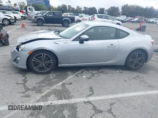 2016 Scion FR-S with VIN JF1ZNAA11G8702268, listed as a IAAI auction lot 41897845 with 133,750 mi miles. Bid and sale history available at carsss.com. Image 14.