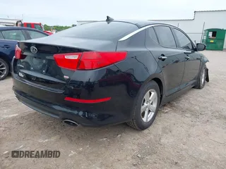 2015 Kia Optima LX z VIN 5XXGM4A70FG517585, wystawiony jako IAAI lot #42193594 z przebiegiem 155 118 mil mil oraz . Historia ofert i sprzedaży dostępna na DreamBid. Obrazek 4.