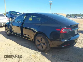 2023 Tesla Model 3 Long Range with VIN 5YJ3E1EB6PF634116, listed as a IAAI auction lot 41814670 with 47,801 mi miles and . Bid and sale history available at DreamBid. Image 3.