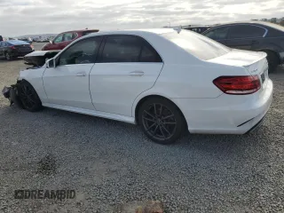 2016 Mercedes-Benz E 350 Sport with VIN WDDHF5KB3GB256120, listed as a Copart auction lot 53558525 with 128,522 mi miles and Salvage Title. Bid and sale history available at DreamBid. Image 2.
